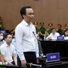 Cựu Chủ tịch Tập đoàn FLC Trịnh Văn Quyết khai báo trước Hội đồng xét xử. (Ảnh: TTXVN)