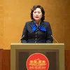 Thống đốc NHNN Nguyễn Thị Hồng trình bày báo cáo tiếp thu, giải trình ý kiến của Ủy ban Thường vụ Quốc hội về dự án Luật Bảo hiểm tiền gửi sáng 10/12.