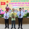 Lãnh đạo tỉnh Đồng Tháp chúc mừng tân Chủ tịch UBND tỉnh Trần Trí Quang (giữa). Ảnh: Cổng TTĐT Đồng Tháp 