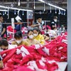 Nhiều doanh nghiệp, trong đó có dệt may, đã tận dụng tốt ưu đãi từ các FTA để gia tăng xuất khẩu. Ảnh: Đức Thanh 