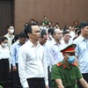 Các bị cáo tại phiên tòa sơ thẩm.