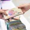 Tiền đồng chịu sức ép giảm giá từ nay tới cuối năm