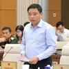  Bộ trưởng Bộ Tài chính Nguyễn Văn Thắng báo cáo tại phiên họp. 