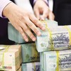 Sau 4 tháng tăng trưởng âm, tiền gửi tổ chức bất ngờ ào ào chảy lại vào ngân hàng 