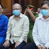 Các bị cáo tại toà.