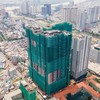 Cả 3 tòa tháp của dự án The Grand Manhattan cùng được đẩy nhanh tiến độ thi công. Ảnh: Việt Dũng.