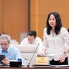 Bộ trưởng Bộ Văn hóa, Thể thao và Du lịch Lâm Thị Phương Thanh trình bày tờ trình - Ảnh: Mediaquochoi.