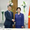 Thủ tướng Lê Minh Hưng tiếp bà Trâu Gia Di, Chủ tịch Ngân hàng Đầu tư Cơ sở hạ tầng Châu Á (AIIB). (Ảnh: Dương Giang/TTXVN)