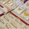 Đà tăng kỷ lục của vàng chững lại trước kỳ vọng Fed giữ lãi suất cao và đồng đô la mạnh