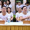 Ông Nguyễn Anh Tuấn, Ủy viên BCH Trung ương Đảng, Bí thư Đảng ủy, Chủ tịch Tổng Liên đoàn Lao động Việt Nam (bên phải); ông Phạm Đức Ấn, Ủy viên BCH Trung ương Đảng, Bí thư Đảng ủy, Thống đốc NHNN (bên trái) tại sự kiện.