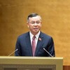 Bộ trưởng Tài chính Ngô Văn Tuấn trình bày trước Quốc hội sáng 21/4