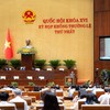 Bộ trưởng Bộ Nội vụ Nguyễn Tiến Hải trình bày Tờ trình tóm tắt về việc thành lập Thành phố Bắc Ninh sáng 6/8.