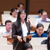 Đại biểu Trịnh Thị Tú Anh (đoàn Lâm Đồng) thảo luận tại hội trường Quốc hội sáng 9/8.