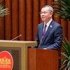 Bộ trưởng Bộ Tài chính Ngô Văn Tuấn báo cáo trước Quốc hội về Nghị quyết tách Dự án Điện hạt nhân Ninh Thuận thành các dự án độc lập chiều 24/8.