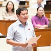 Đại biểu Tạ Minh Tâm (đoàn Đồng Tháp) phát biểu tại hội trường chiều 30/10.