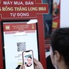 Mua vàng bằng máy "ATM" trước ngày Vía Thần tài
