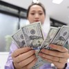 Lãi suất huy động hạ nhiệt, tỷ giá chịu thêm sức ép 