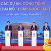 Thủ tướng Chính phủ Phạm Minh Chính cùng các đại biểu thực hiện nghi thức bấm nút khởi công, khánh thành đồng loạt 234 dự án lớn trên cả nước vào ngày 19/12/2025 - Ảnh: VGP
