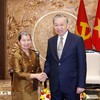 Tổng Bí thư Ban Chấp hành Trung ương Đảng Cộng sản Việt Nam Tô Lâm cùng bà Men Sam An, Phó Chủ tịch Đảng Nhân dân Campuchia. Ảnh: TTXVN