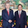 Tổng Bí thư Tô Lâm và Chủ tịch Đảng Nhân dân Campuchia Hun Sen. (Ảnh: TTXVN)