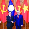Tổng Bí thư Tô Lâm và Tổng Bí thư, Chủ tịch nước Lào Thongloun Sisoulith chụp ảnh chung trước khi tiến hành hội đàm nhân chuyến thăm cấp Nhà nước của Tổng Bí thư, Chủ tịch nước Lào tới Việt Nam vào tháng 1/2026. Ảnh: Đức Thanh 