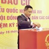 Bí thư Thành ủy Đà Nẵng Lê Ngọc Quang bỏ phiếu tại khu vực bỏ phiếu số 15, phường Hải Châu, Đà Nẵng. Ảnh: Đ.N