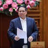 Thủ tướng Phạm Minh Chính chủ trì cuộc họp của Thường trực Chính phủ về nguồn kinh phí hỗ trợ bình ổn giá xăng dầu Ảnh: VGP