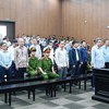 Các bị cáo bị đưa ra xét xử tại phiên tòa sơ thẩm (Ảnh: H.N) 