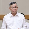 Bộ trưởng Bộ Tài chính Ngô Văn Tuấn báo cáo tại Phiên họp - Ảnh: VGP.