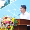 Phó Chủ tịch UBND TP. Hà Nội Nguyễn Xuân Lưu trình bày tham luận tại Hội nghị.