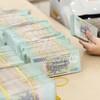 Nhà băng giảm “nệm dự phòng” để làm đẹp lợi nhuận 