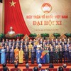 Đoàn Chủ tịch Ủy ban Trung ương Mặt trận Tổ quốc Việt Nam khóa XI ra mắt Đại hội (Ảnh: Quang Vinh) 