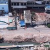 Tiến độ thi công dự án cải tạo môi trường bờ bắc kênh Đôi đang bị ảnh hưởng do hệ thống hạ tầng kỹ thuật chưa di dời -Ảnh: HT