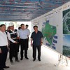 Phó Thủ tướng Thường trực Chính phủ Phạm Gia Túc nghe báo cáo về tiến độ dự án đầu tư mở rộng Cảng hàng không quốc tế Phú Quốc - Ảnh: VGP.