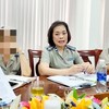 Bà Nguyễn Thị Phương Lan, nguyên Chi cục trưởng Chi cục THADS TP .Đồng Hới (ở giữa) trong một lần trả lời báo chí. Ảnh: Hoàng Nam