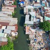 Việc bàn giao mặt bằng không liên tục gây khó khăn cho việc thi công dự án rạch Xuyên Tâm - Ảnh: Lê Toàn