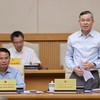 Bộ trưởng Bộ Tài chính Ngô Văn Tuấn báo cáo tại Phiên họp - Ảnh: VGP