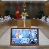Phó Thủ tướng Thường trực Phạm Gia Túc làm việc về tình hình triển khai dự án đường sắt Lào Cai - Hà Nội - Hải Phòng - Ảnh: VGP