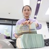 Để giảm áp lực lên tỷ giá, nền kinh tế đang phải chấp nhận một mặt bằng lãi suất cao hơn kỳ vọng