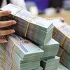 Đầu tư ra nước ngoài: NHNN khống chế trần cho vay ở mức 70% vốn dự án 