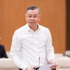Bộ trưởng Bộ Tài chính Ngô Văn Tuấn trình bày tờ trình. 