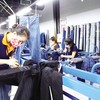 Trong 7 tháng đầu năm, nền kinh tế Việt Nam vẫn duy trì đà tăng trưởng tích cực. Trong ảnh: Sản xuất tại Tổng công ty Phong Phú. Ảnh: Lê Toàn