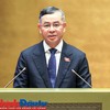 Bộ trưởng Bộ Tài chính Ngô Văn Tuấn trình bày báo cáo giải trình tại Quốc hội - Ảnh Đức Thanh.
