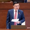 Bộ trưởng Bộ Công thương Lê Mạnh Hùng báo cáo giải trình - Ảnh: QH.