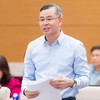 Bộ trưởng Bộ Tài chính Ngô Văn Tuấn trình bày đề xuất của Chính phủ - Ảnh: QH. 