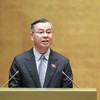 Bộ trưởng Bộ Tài chính Ngô Văn Tuấn trình bày tờ trình - Ảnh Đức Thanh. 