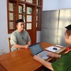 Vũ Hoàng Hải (còn gọi là Hải Sapa TV) tại Cơ quan điều tra. Ảnh: BCA