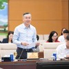  Bộ trưởng Bộ Tài chính Ngô Văn Tuấn báo cáo tại phiên họp - Ảnh: QH. 