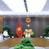 Phó Thủ tướng Lê Tiến Châu chủ trì họp về triển khai tổng rà soát hệ thống văn bản quy phạm pháp luật - Ảnh: VGP