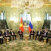 Tổng Bí thư, Chủ tịch nước Tô Lâm gặp hẹp Tổng thống Nga V.V. Putin. Ảnh: Thống Nhất/TTXVN.